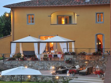 Gazebo in ferro Ottoemezzo di Unosider con tende laterali